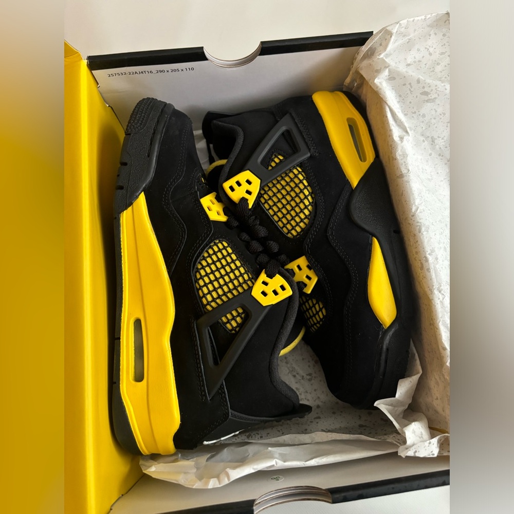 Jordan 4 Retro (Thunder) Black and Yellow 5Y/ or 6.5 in women